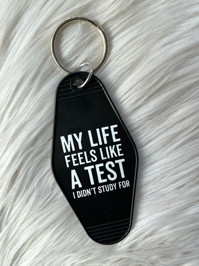 Life Feels Like A Test Keychain